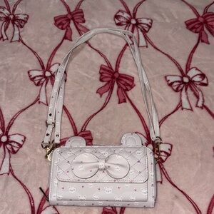 Under One Sky White Bow Accent Crossbody with Bear Motif